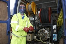 A BDS worker and equipment in a van