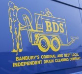 Bourton Drain Services Logo on the side of a van